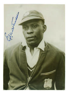 Emmanuel Alfred Martindale. Barbados & West Indies 1929-1939. Excellent pre 1939 tour, head and shoulders, press photograph of Martindale wearing West Indies cap and blazer. Nicely signed in ink by Martindale. 6&rdquo;x8&rdquo;. Keystone Press Agency photograph. Exce