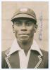 Vincent Adolphus Valentine. West Indies 1933. Excellent pre 1933 tour, head and shoulders, press photograph of Valentine wearing West Indies cap and blazer. Nicely signed in ink by Valentine, some smudging to signature . 4&rdquo;x6&rdquo;. Central Press Agency. Excel