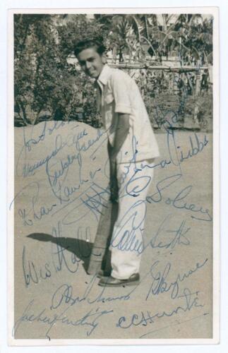 West Indies tour of India & Pakistan 1958/59. A postcard size photograph of a young Indian cricketer, signed to image by fourteen members of the West Indies touring party. Signatures include Alexander (Cpt), Hunte, Sobers, Hall, Ramadhin, Hendriks, Gibbs