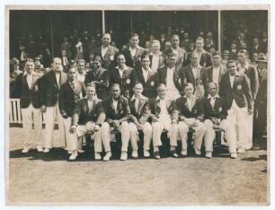 Hedley Verity. Yorkshire & England 1930-1939. England v India, The Oval 1936. Large original mono press photograph of the two teams together for the 3rd Test, 15th- 18th August 1936, in front of the pavilion with crowds looking on. The players seated and 