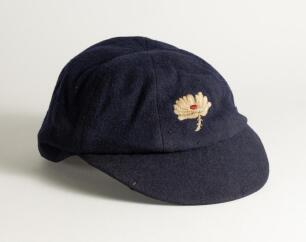 Hedley Verity. Yorkshire & England 1930-1939. Yorkshire navy blue 1st XI cap, by &lsquo;W.V. Brown, Hosier, Eton&rsquo;. The cap with the Yorkshire white rose emblem to the front, worn by Verity during his playing career with the county. Slight moth holing to peak an