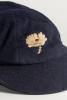 Hedley Verity. Yorkshire & England 1930-1939. Yorkshire navy blue 1st XI cap, by &lsquo;W.V. Brown, Hosier, Eton&rsquo;. The cap with the Yorkshire white rose emblem to the front, worn by Verity during his playing career with the county. Slight moth holing to peak an - 2