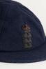 Hedley Verity. Yorkshire & England 1930-1939. England navy blue cloth Test cap with raised wired emblem of the three lions and crown to front. The cap made by E.C. Devereux of Eton, Bucks with &lsquo;H. Verity&rsquo; handwritten in black ink to inner label of cap. Od - 2